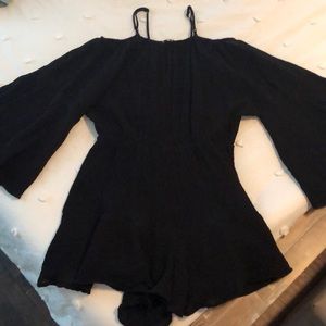 Black romper with bell sleeves